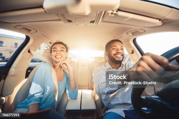 Enjoying Travel Excited African Couple Driving Car Stock Photo - Download Image Now