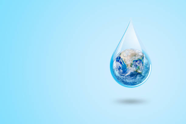 istock Ecology and Pollution Concept : Blue planet earth globe in water drop with blue background. 1166777907