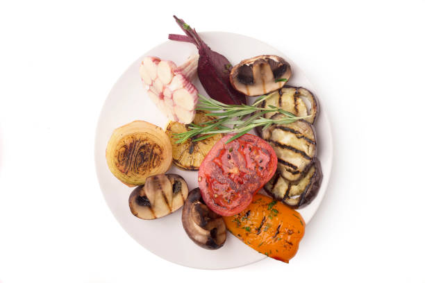 istock Plate with freshly cooked grill vegetables on white 1166778905