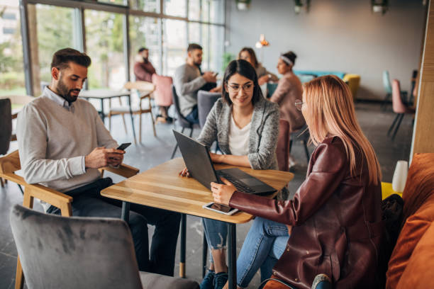 istock Modern people sitting in cafe 1166780446