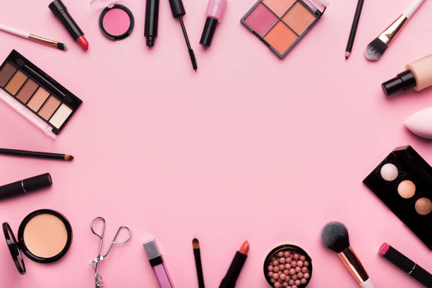 istock Frame of professional cosmetics and brushes around blank space 1166780952