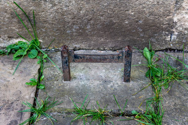 istock Close-up image of an old-fashioned boot scraper embedded in a concrete slab in North Yorkshire, England. 1166782155