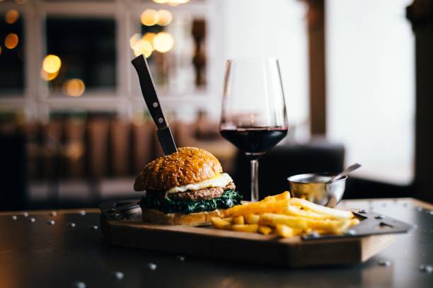 tasty burger with red wine - beer hamburger american culture beef imagens e fotografias de stock