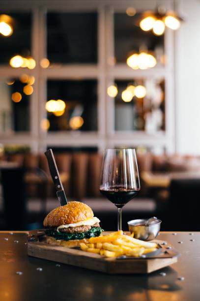 tasty burger and red wine - beer hamburger american culture beef imagens e fotografias de stock