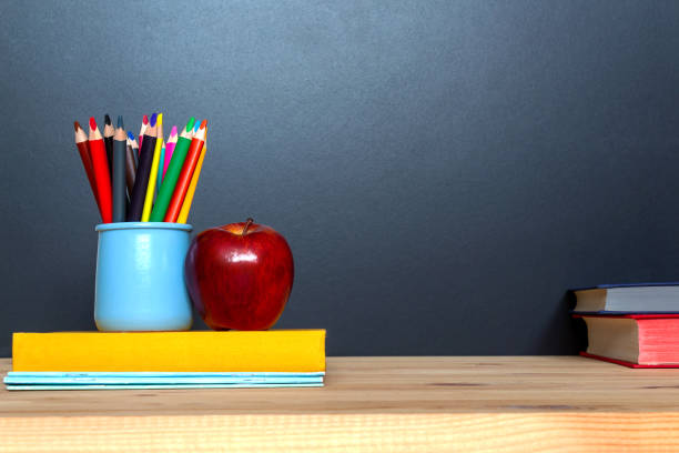 istock Education concept. Colorful pensils on blackboard background. 1166784772