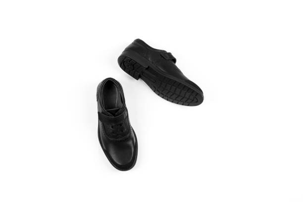 black children’s leather shoes with a white background, isolate black children’s leather shoes with a white background, isolate . leather clasp stock pictures, royalty-free photos & images