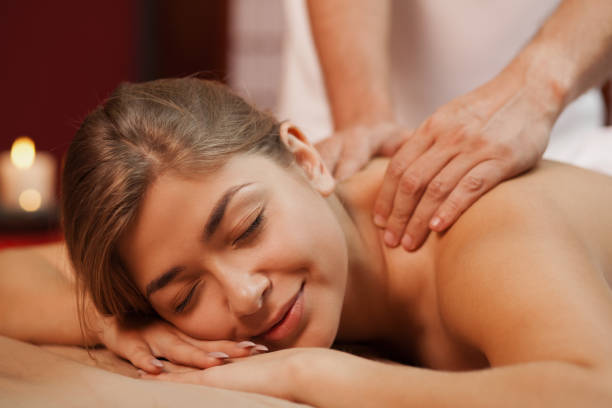 istock Beautiful woman getting massage 1166789200