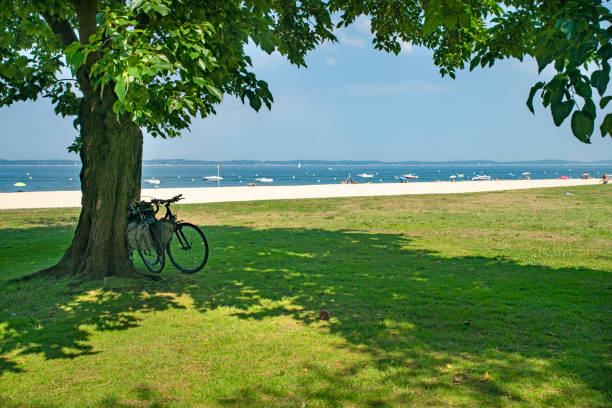 Two bikes in front of a preserved beach at Brittany (France)Similar: