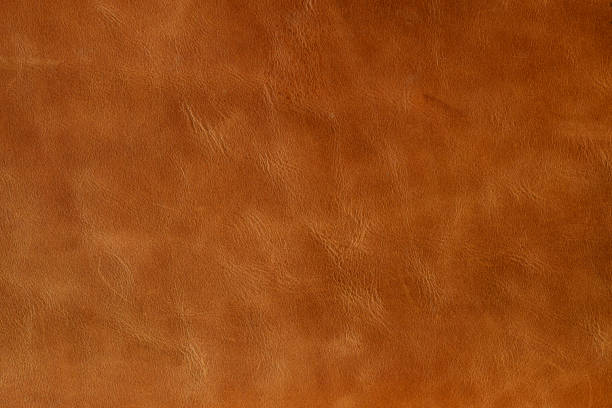 istock light brown or orange genuine leather texture background, genuine leather 1166793683