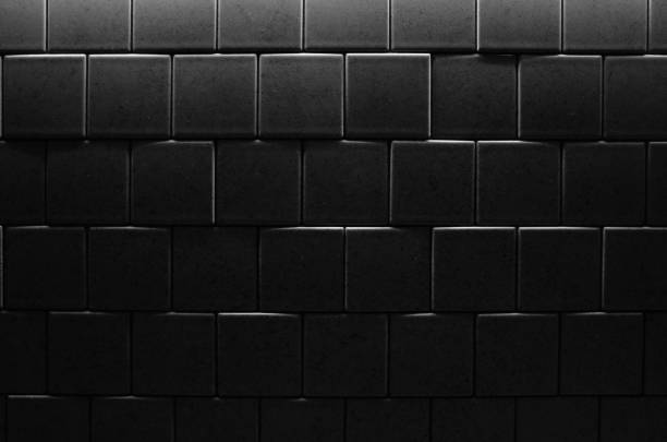 istock Tiled wall in dark room with poor illumination 1166796933