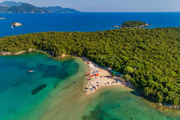 Aerial drone bird's eye view of Bella Vraka Beach with turquoise sea in complex islands in Sivota area, Ionian sea, Epirus, Greece