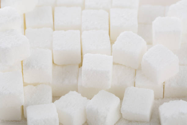 istock Sugar cube ingredient closeup. Sugar cube food ingredient background 1166801883