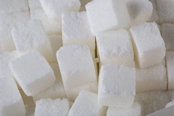 istock Sugar cube ingredient closeup. Sugar cube food ingredient background 1166802305