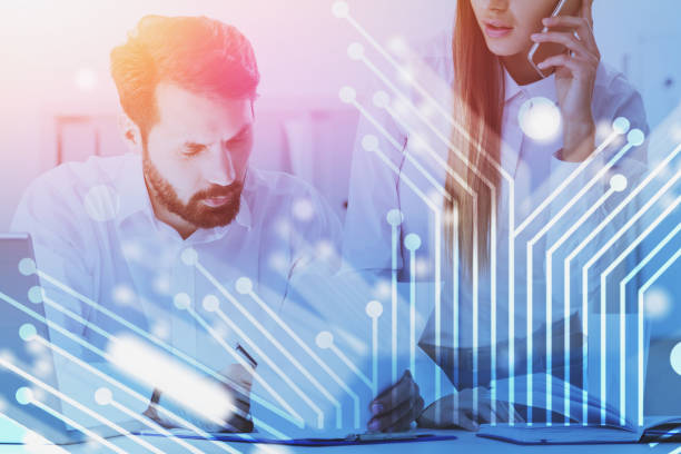 istock Man and woman in office, technology 1166802525