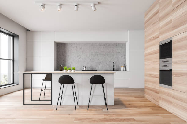 istock White and wooden kitchen interior with bar 1166802579