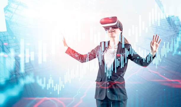 istock Woman in VR headset working with graphs 1166802657