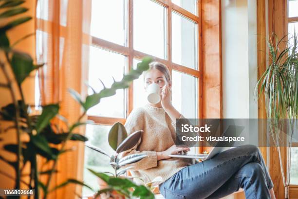 Candid Portrait Of Woman Drinking Coffee Stock Photo - Download Image Now - Coffee - Drink, Domestic Life, One Woman Only