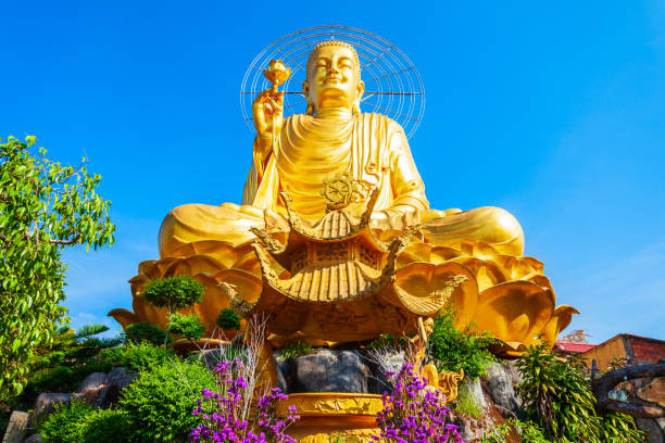 Golden Buddha statue in Dalat The Golden Buddha statue or Thien vien Van Hanh in Dalat city in Vietnam central highlands vietnam photos stock pictures, royalty-free photos & images