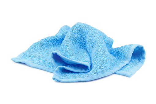 Crumpled blue towel, isolated on white background