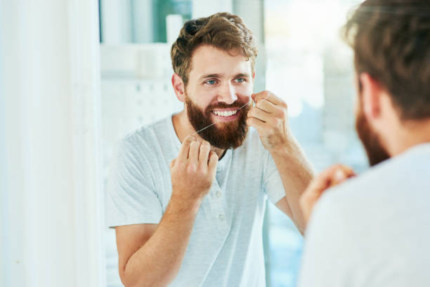 istock Floss for healthier teeth 1166807059