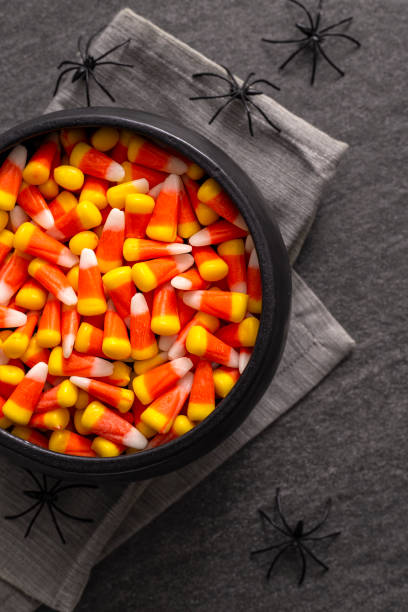 istock Halloween Candy Corn in a Bowl Spooky Spiders 1166808784