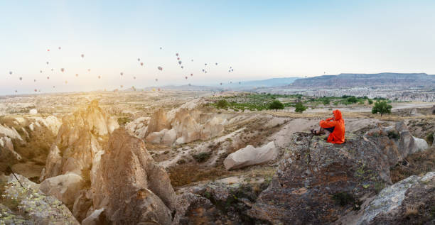 istock Man meets the dawn over Cappadocia 1166812509