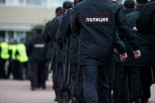 istock Russian police squad formation back view with 1166812537