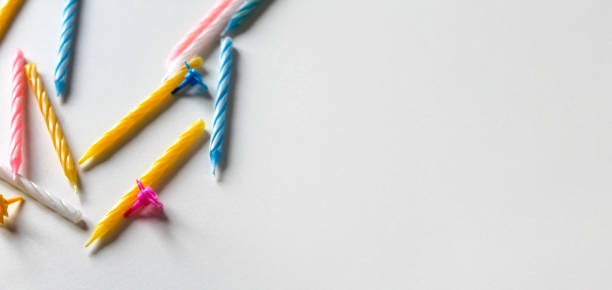 istock Bright colorful birthday candles on white background 1166812559