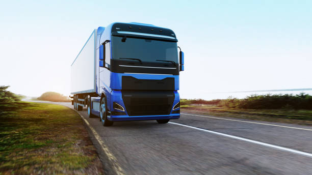 istock semi-truck with trailer driving on road 1166812838