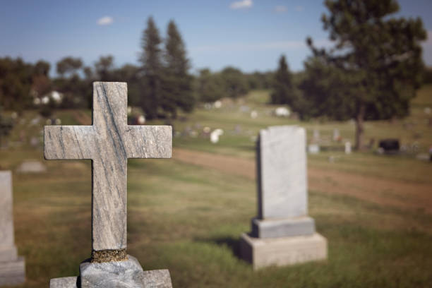 istock concrete crosses at a cemetery 1166814225