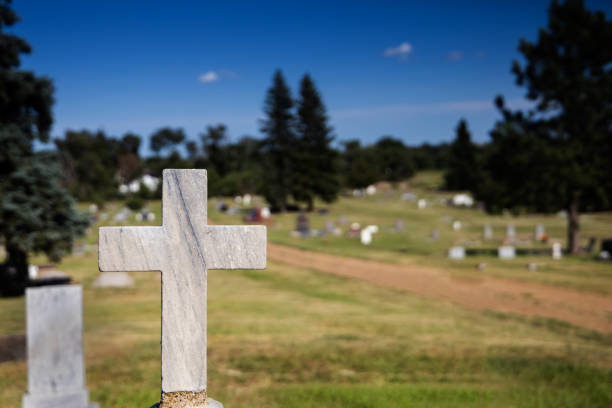 istock concrete crosses at a cemetery 1166814467