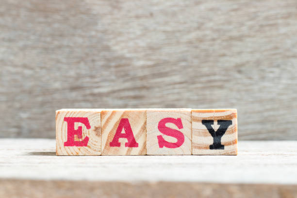Letter block in word easy on wood background