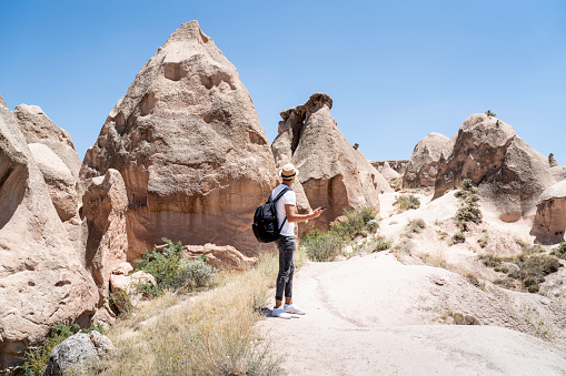Rear View Of A Young Man Exploring Goreme