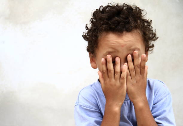 istock boy crying in poverty stock image 1166819310
