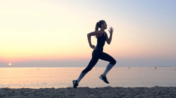 istock Jogging after sunset. Beach holiday 1166820678