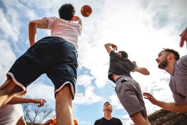 istock Two basketball players having a jump standoff 1166824164