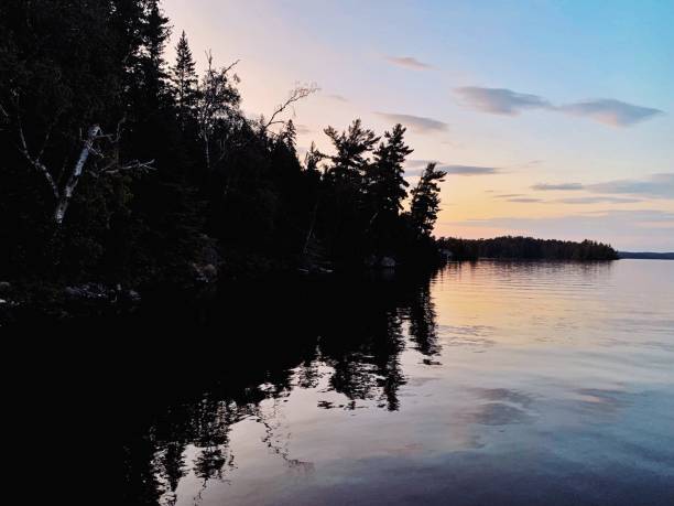 istock Beautiful sunset over lake in northwoods 1166824304
