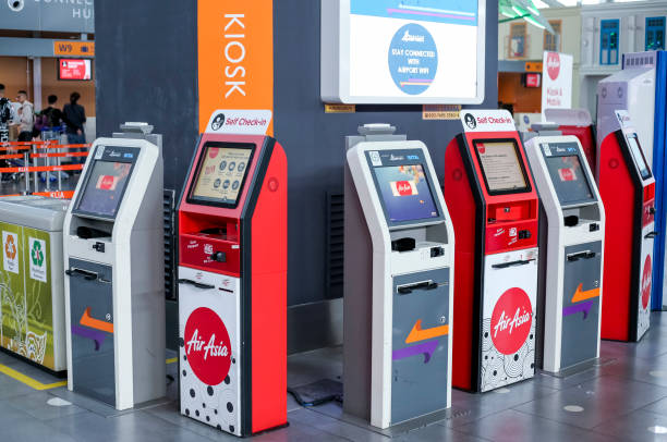 Self check in kiosk at KLIA2 Kuala Lumpur, Malaysia - March 20, 2018 : Self check-in kiosk at departure Hall of Kuala Lumpur International Airport 2 (KLIA2). kuala lumpur airport stock pictures, royalty-free photos & images