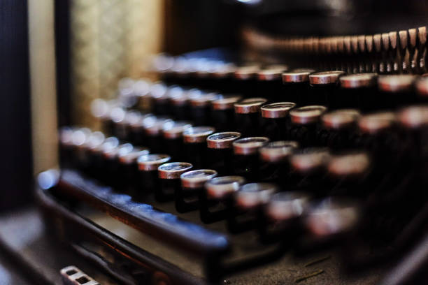 istock Letters on the keys of an old typewriter 1166831339