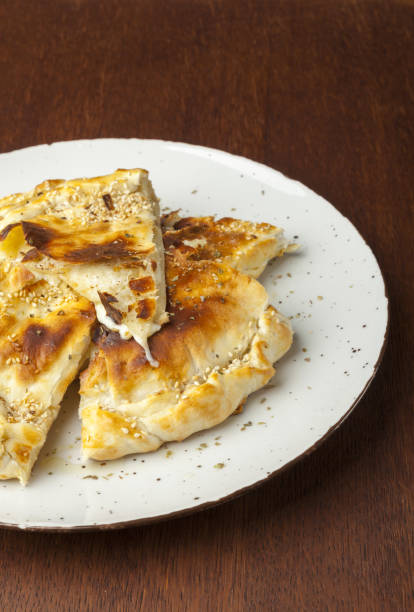 istock pizza dough with garlic and cheese 1166832298