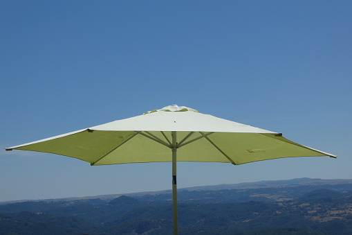parasol at the top of the Organs in Bort-les-Orgues, I took the photo for the beauty of the colors and the panorama