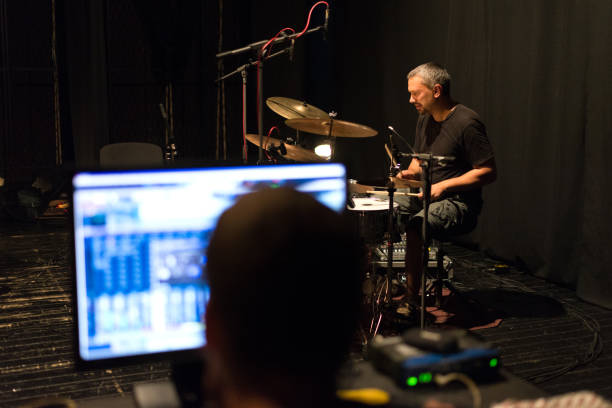 istock Drummer playing drums in the music recording studio 1166835384