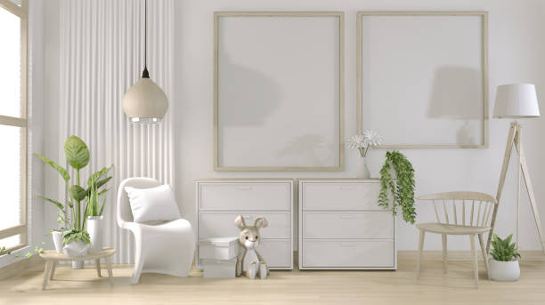 istock mock up poster frame and white white living room minimal design.3D rendering 1166841971