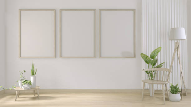 istock mock up poster frame and white white living room minimal design.3D rendering 1166842158