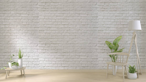 istock mock up white brick wall on floor wooden and decoration plants.3D rendering 1166842159