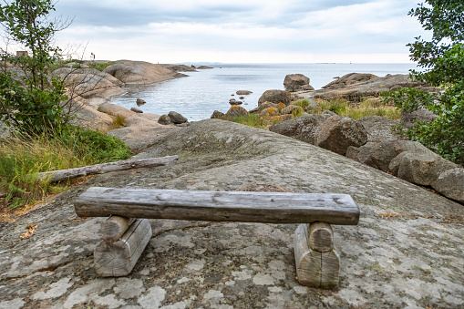 Soothing, seascape. Rocky island in the Baltic Sea. Finland. A pacifying, relaxing vit from an observation deck, benches.