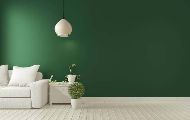istock Mock up poster frame on dark green living room interior.3D rendering 1166843025