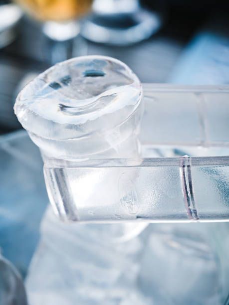 istock big ice cube in ice tongs close up 1166847930
