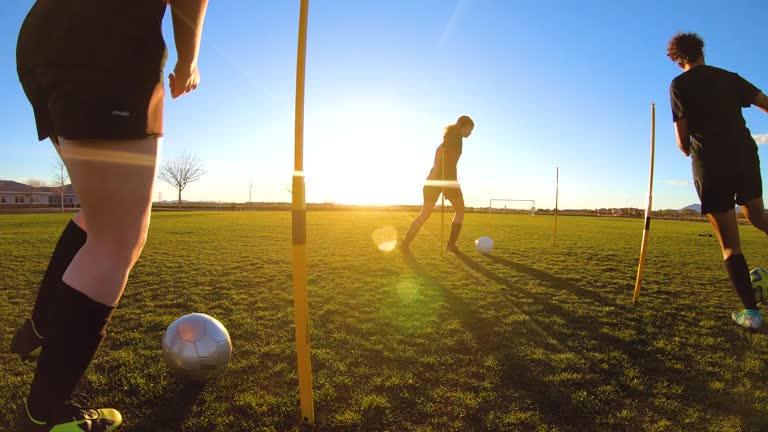 Female Soccer Players Practicing Ball Skills