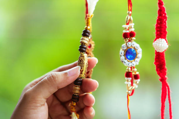 istock Beautiful Handmade rakhis On a Blurred Background 1166848378